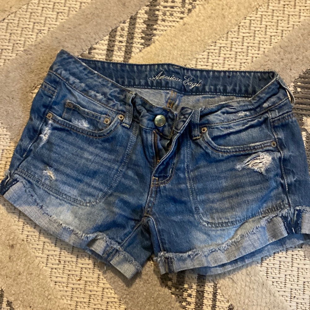 low rise light wash american eagle shorts